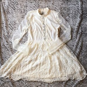 Ivory lace dress with sheer details